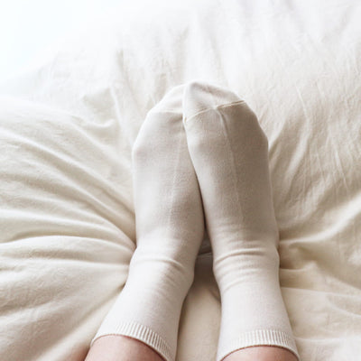 Why should you wear socks at home?